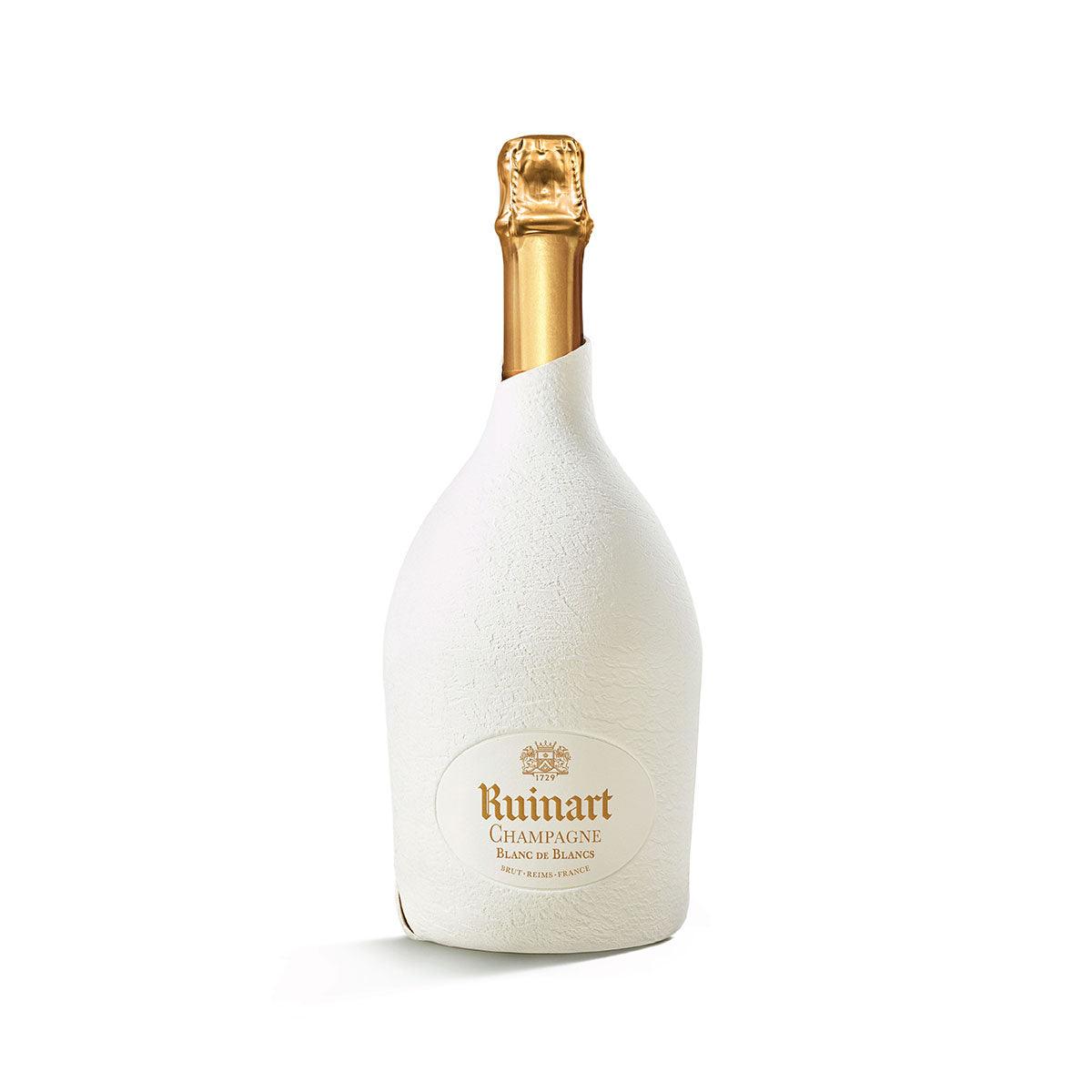 Ruinart champagne bottle with gold foil top and white label