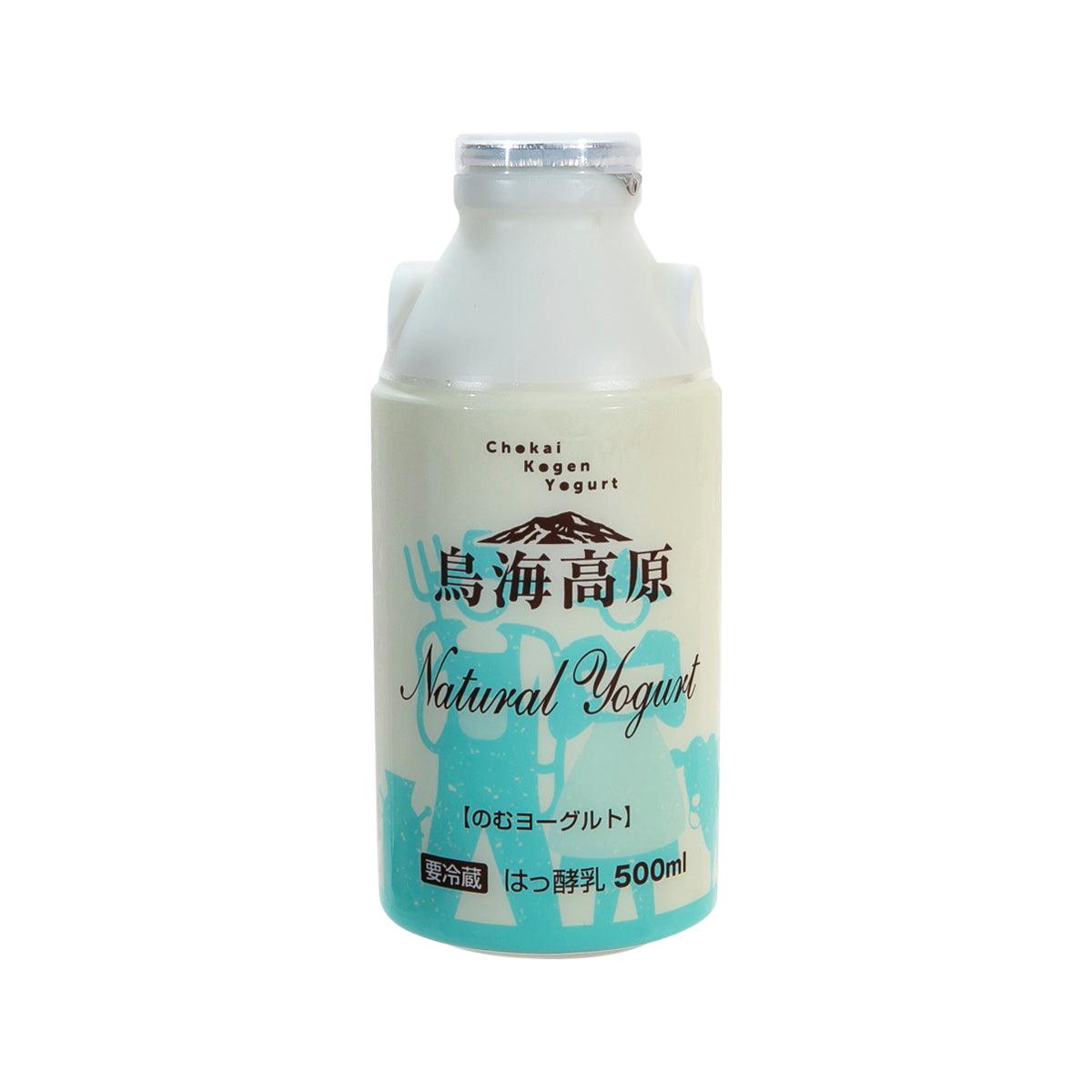 Natural yogurt drink bottle (500 mL) with blue label and clear cap.