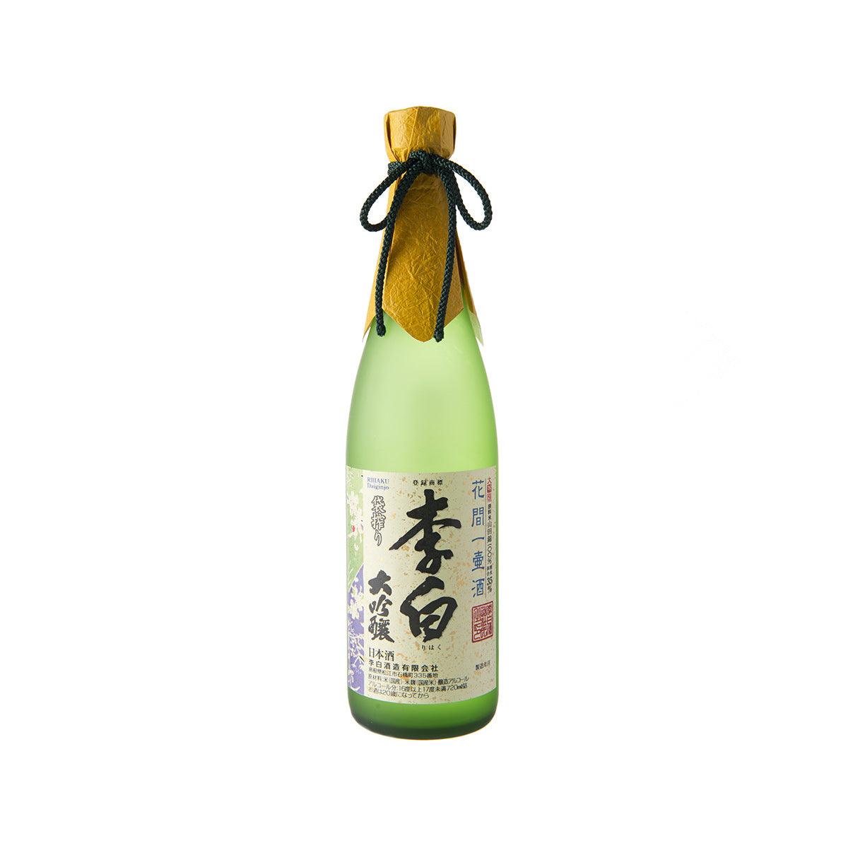 RIHAKU daiginjo sake bottle with green glass, gold cap, blue shibori drawstring
