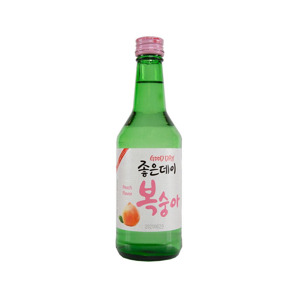 Peach-flavored soju bottle with green glass and pink cap; front label visible