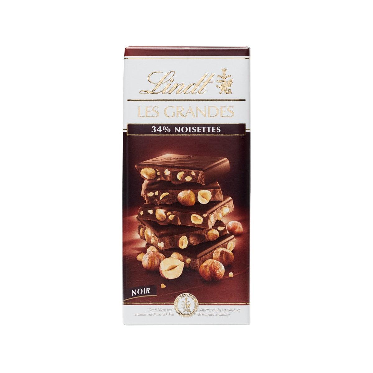 LINDT Les Grandes 34% hazelnut dark chocolate pouch, with hazelnuts and chocolate pieces