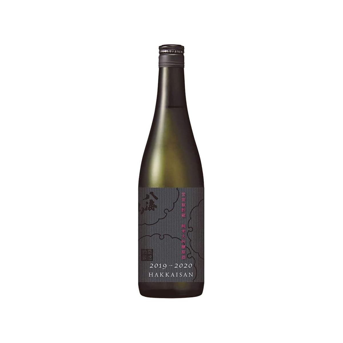 HAKKAISAN snow-aged Junmai Daiginjo sake bottle, dark bottle with vintage 2019 label