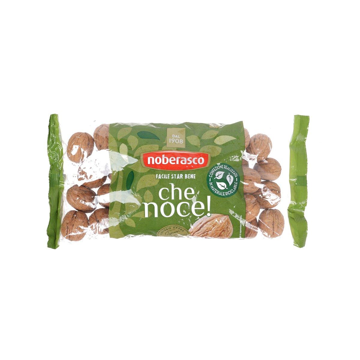 NOBERASCO walnuts in shell in sealed green bag, visible kernels and brown shells