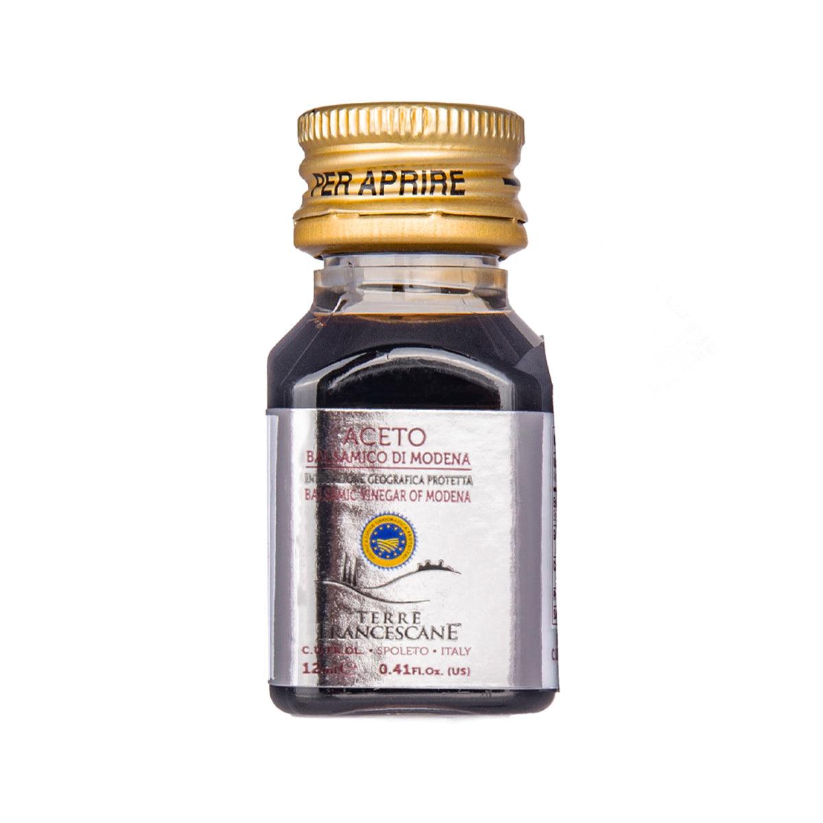Small balsamic vinegar bottle, dark glass with gold cap and white label, 12 mL