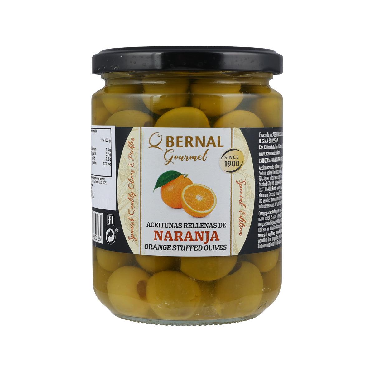 BERNAL jar of orange-stuffed olives in glass container, sealed with black lid