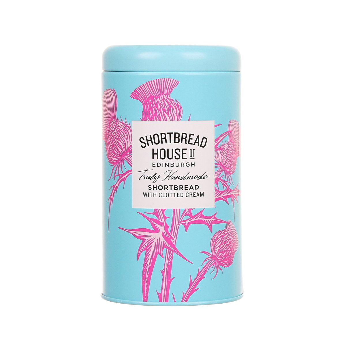 Blue shortbread tin with pink label and clotted cream wording