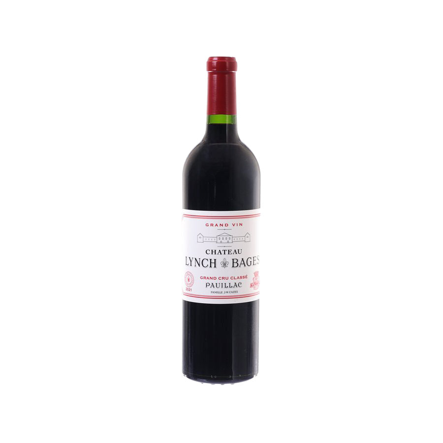 Red wine bottle with foil neck and label, dark glass, red cap