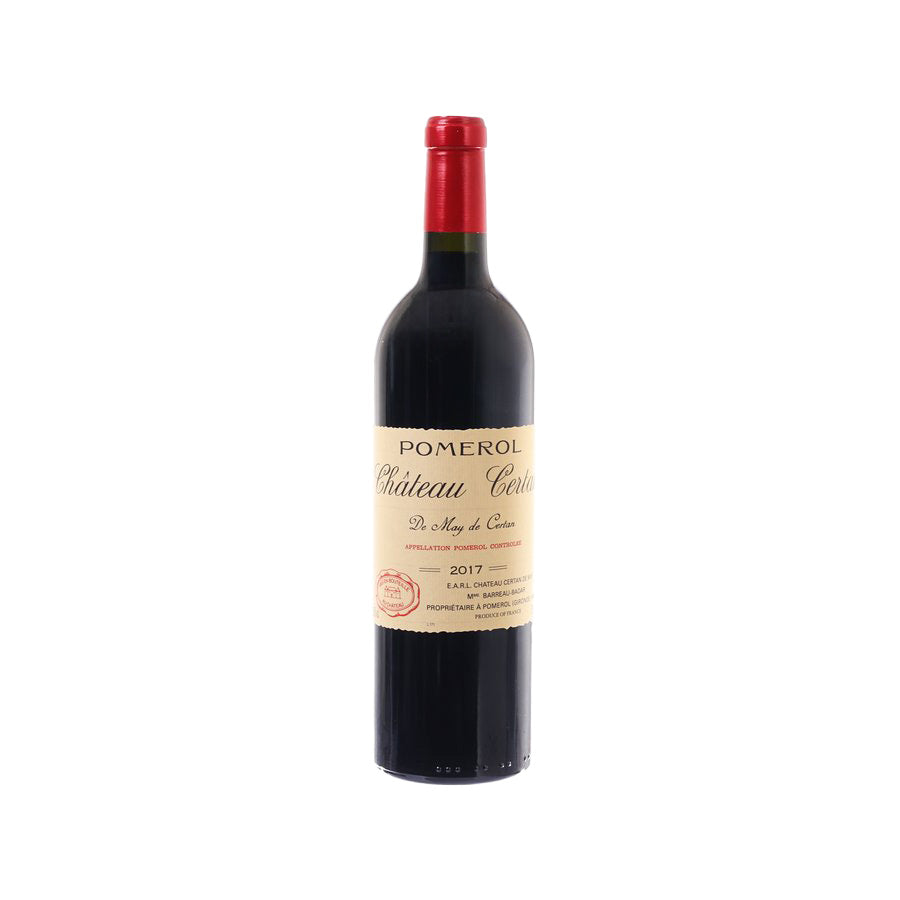 Wine bottle with dark glass and red cap, label on front