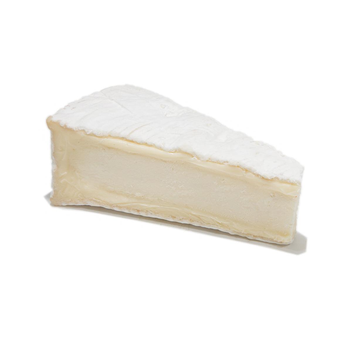 ROUZAIRE Brie de Nangis cheese wedge, white rind and creamy interior.