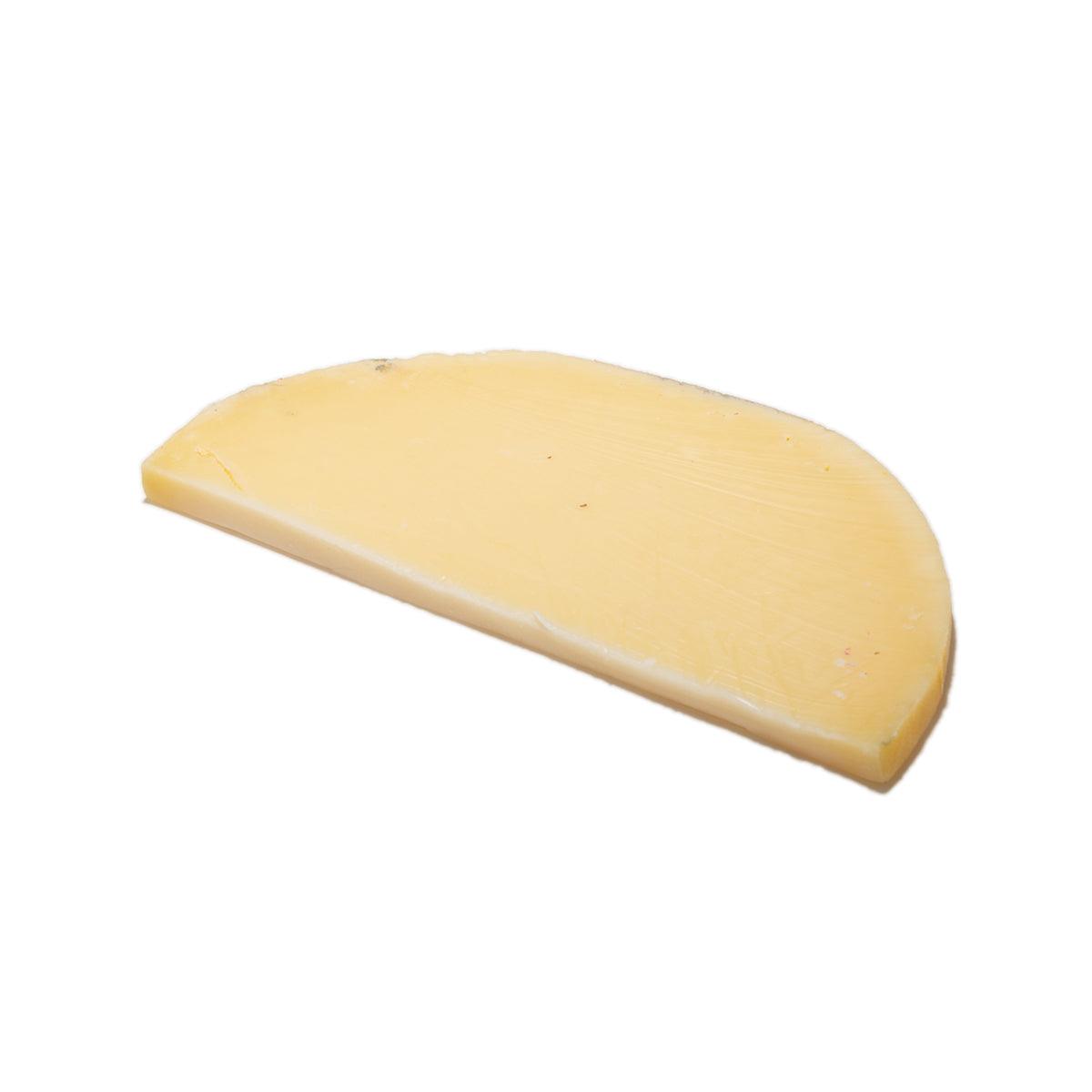 EDAM mild cheese wedge, pale yellow semi-hard cheese