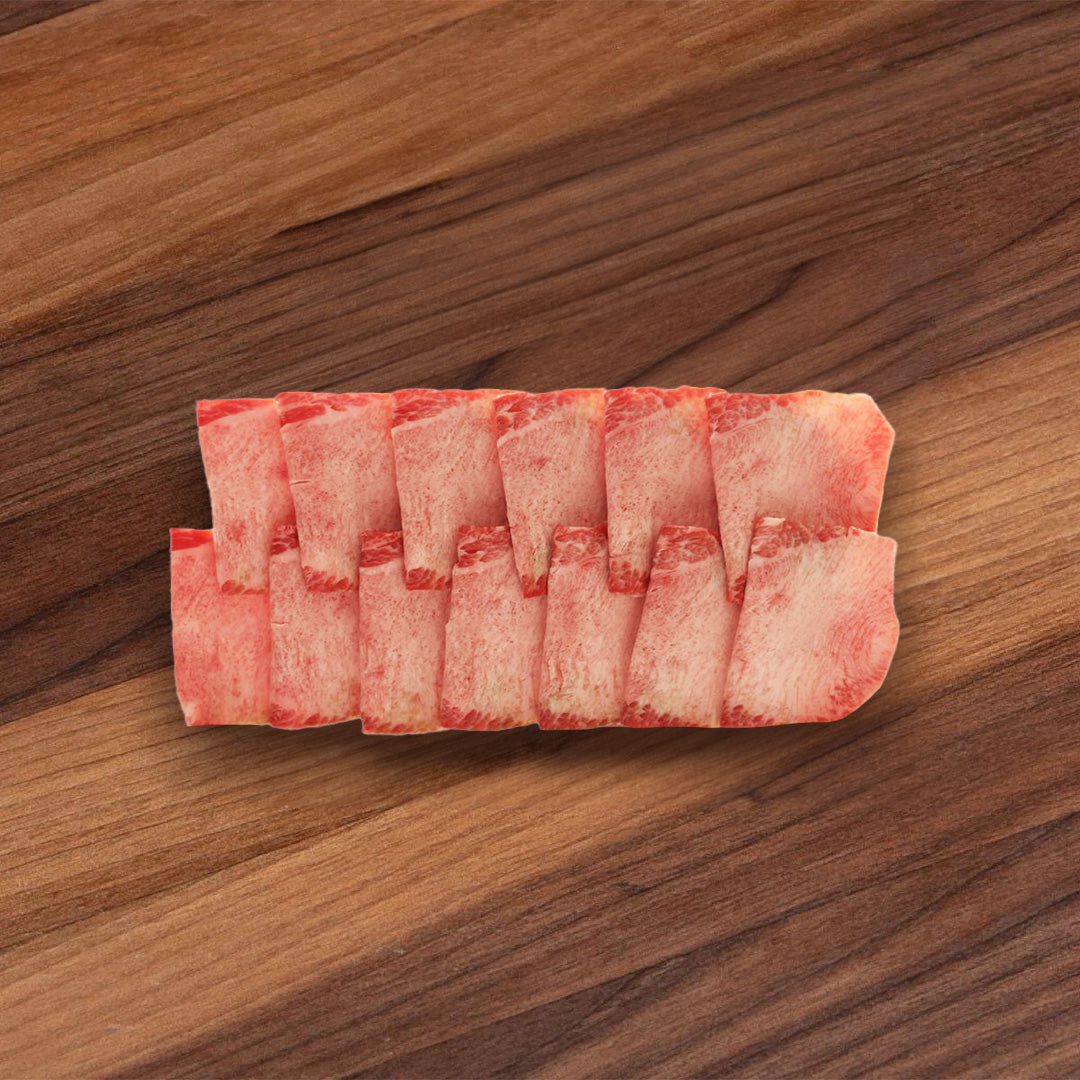 Chilled wagyu ox tongue slices, pink-red with white marbling