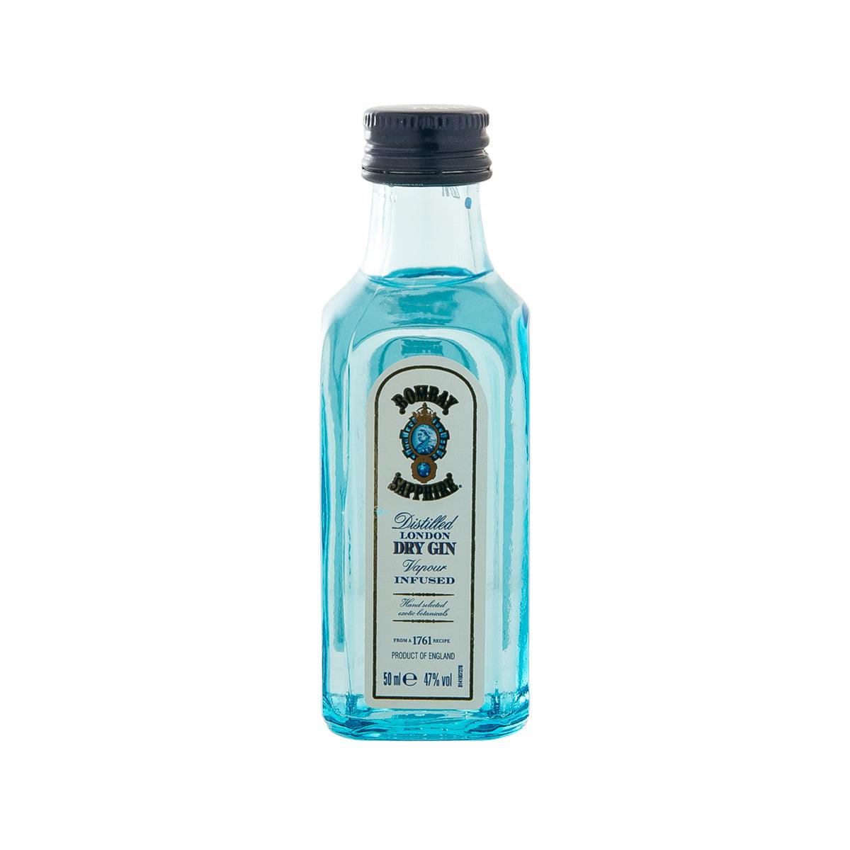 Bombay Sapphire dry gin bottle, clear blue glass with dark cap and label