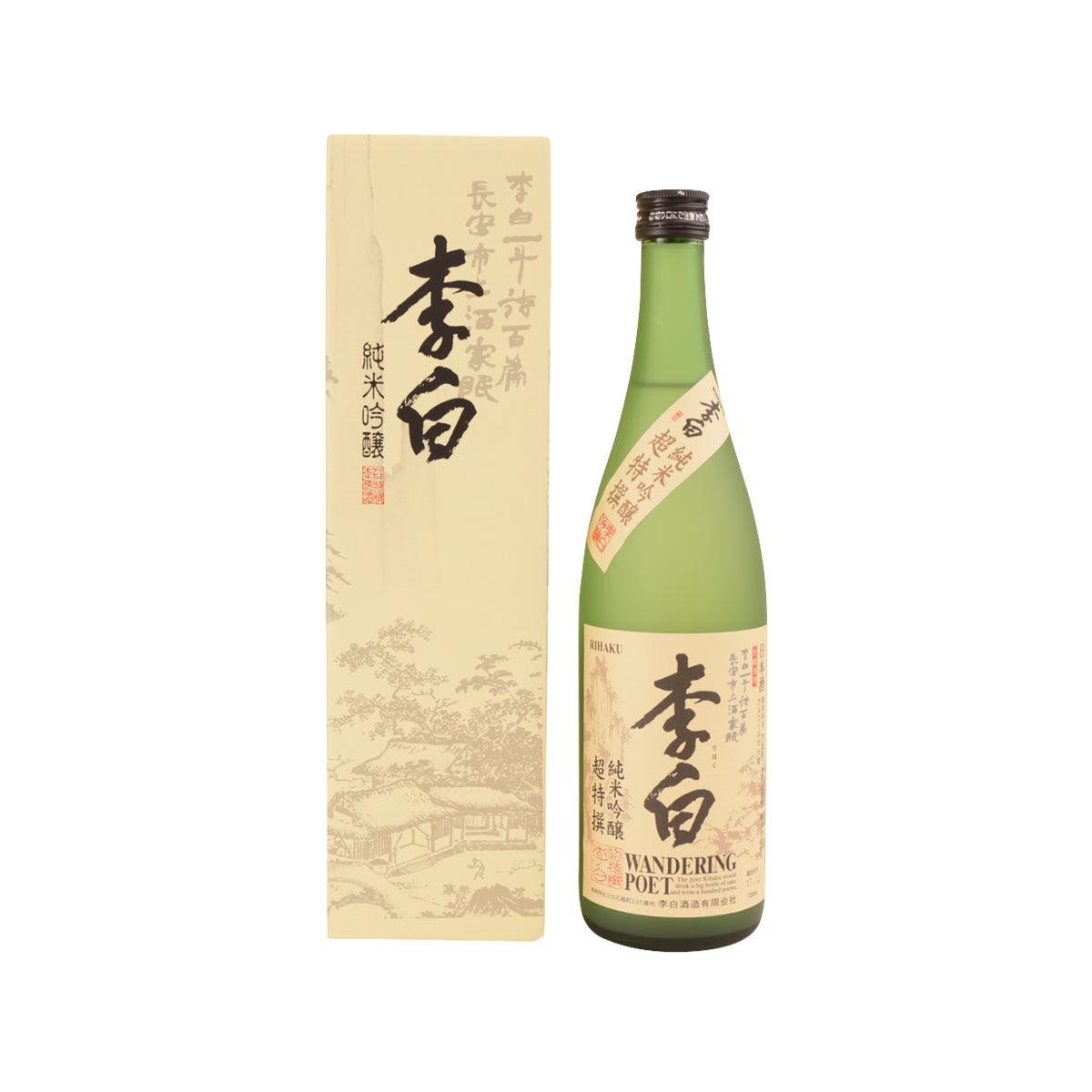 Junmai ginjo sake bottle in green glass with matching gift box