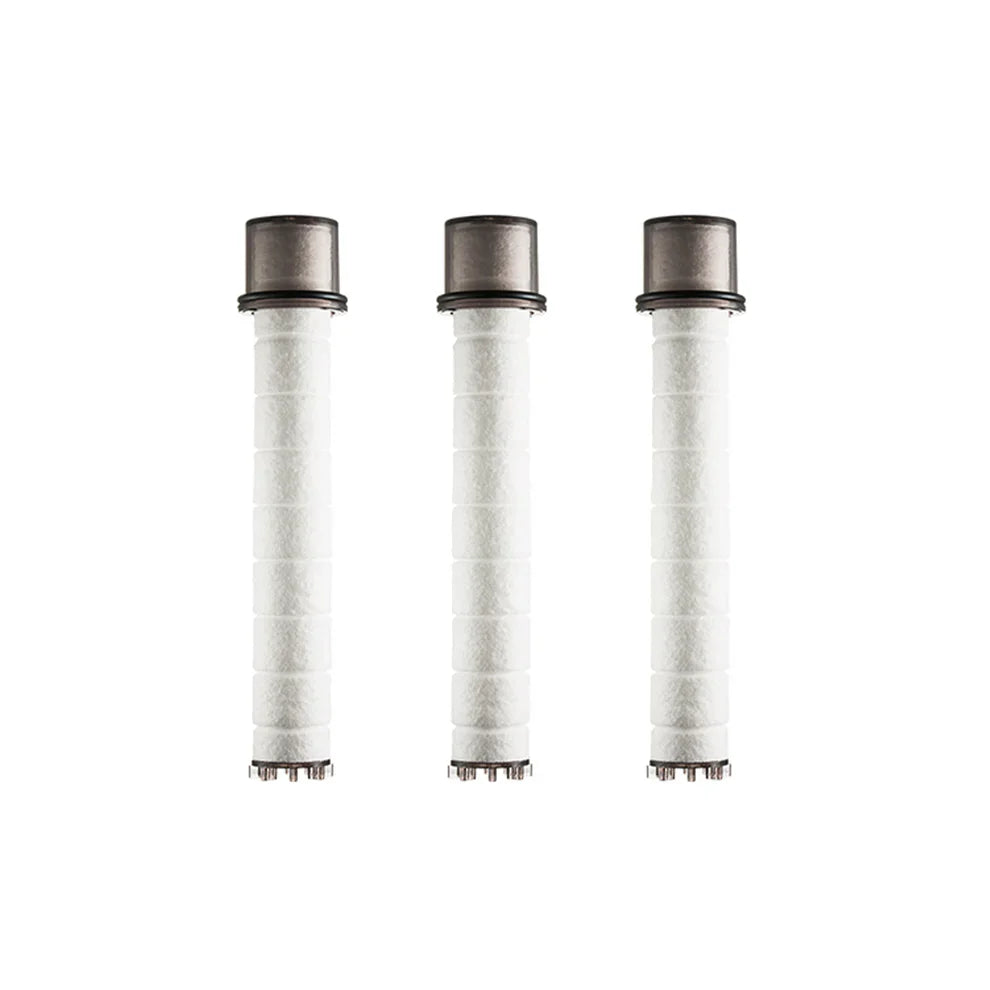 Three cylindrical BODYLUV shower head filter cartridges with mesh ends