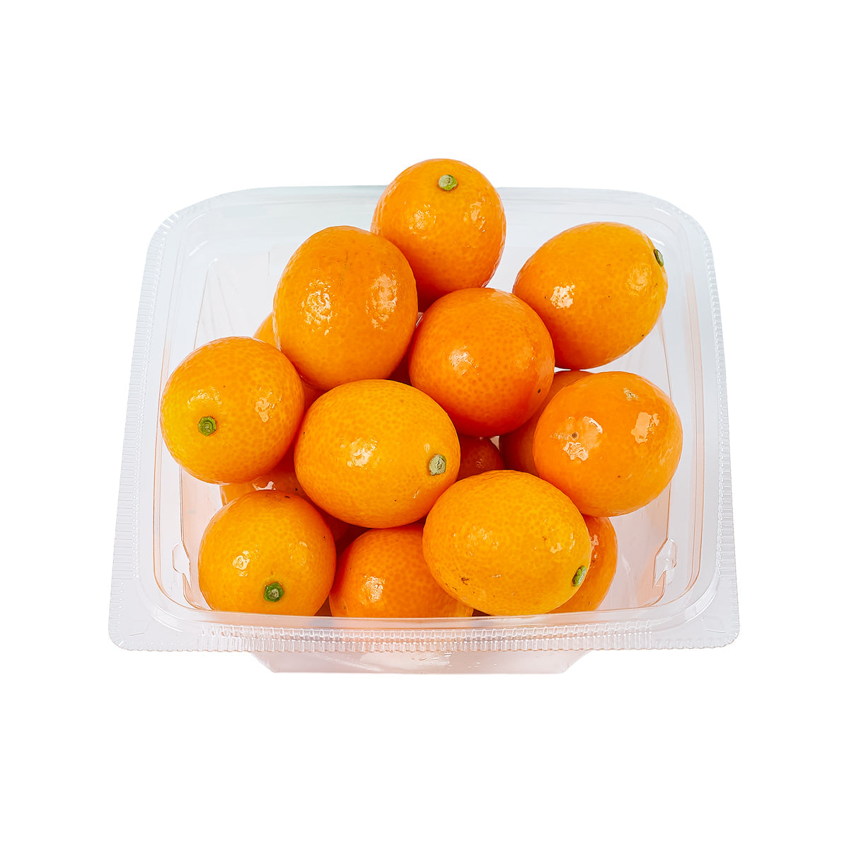 Pack of small bright orange kumquat fruits in clear plastic tray