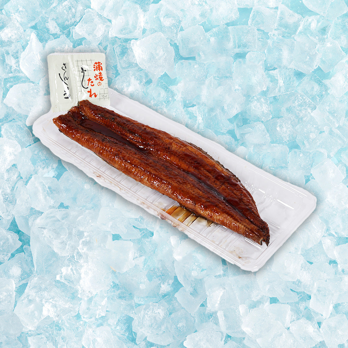 Previously frozen kabayaki eel fillets on white foam tray