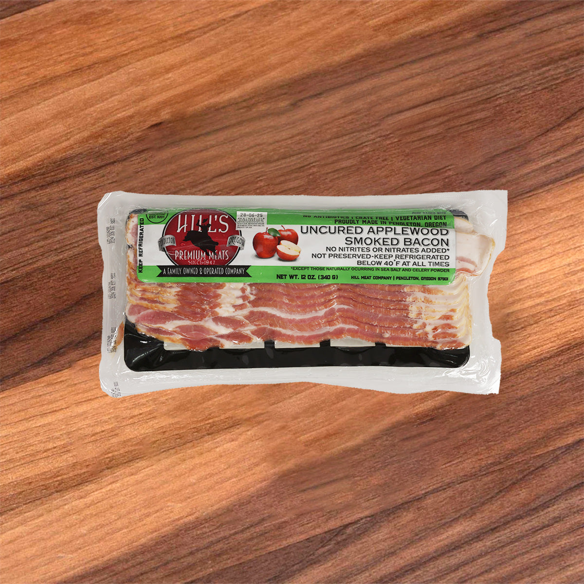 HILLSMEAT uncured applewood smoked bacon slices in clear plastic package, strip-cut