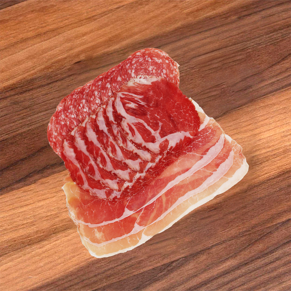 Cured salami and ham slices with fatty white and red marbling