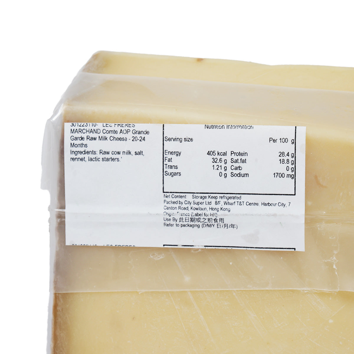 Wrapped Comte-style cheese with nutrition information label, pale yellow surface