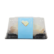 Rare cheese tart set in clear plastic tray with black base, blue label band