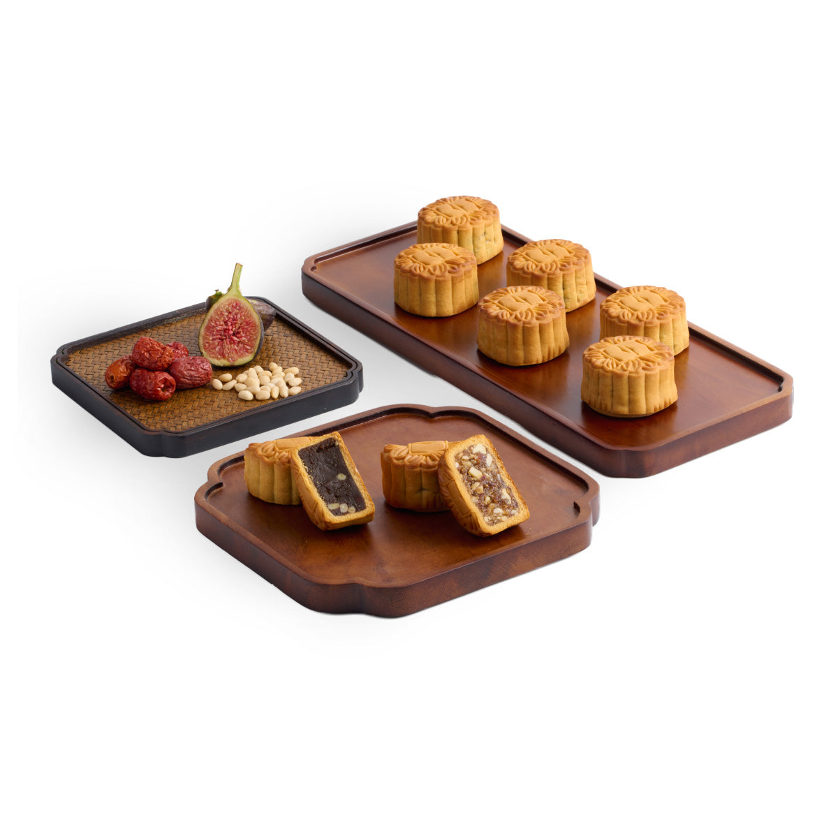 Vegetarian mooncakes with assorted fillings on dark trays
