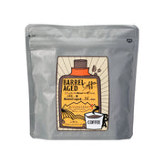 Whiskey barrel aged dark roast coffee beans bag, 100g, front logo and artwork