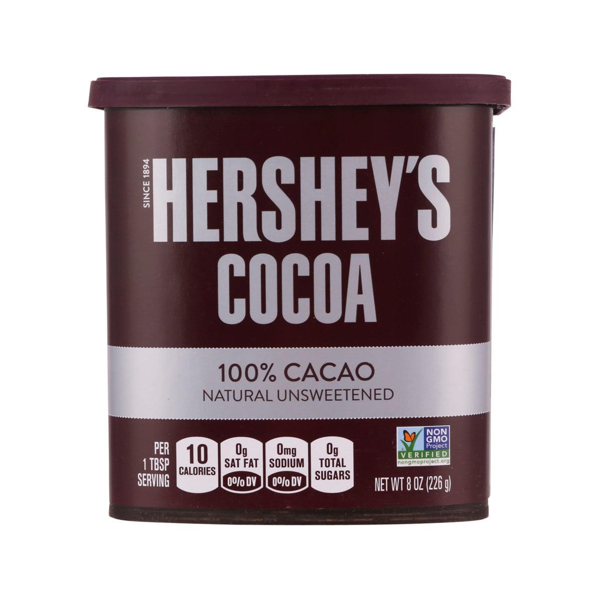 HERSHEY'S cocoa powder container, maroon label with 100% cacao and unsweetened text.