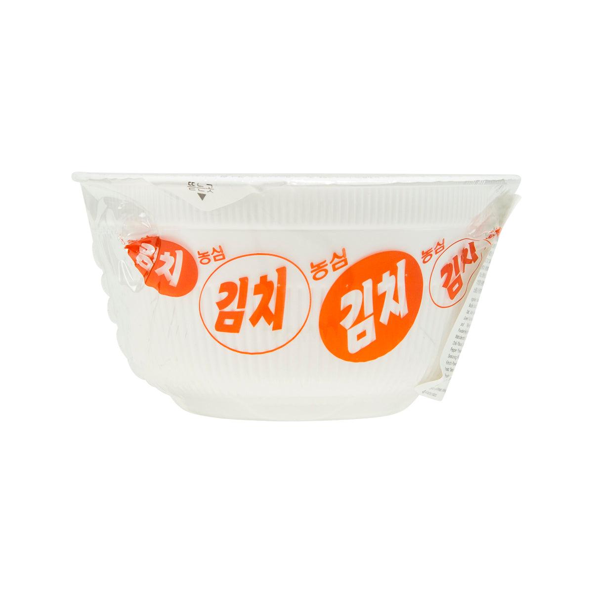 White noodle cup with orange kimchi flavor branding and circular logos