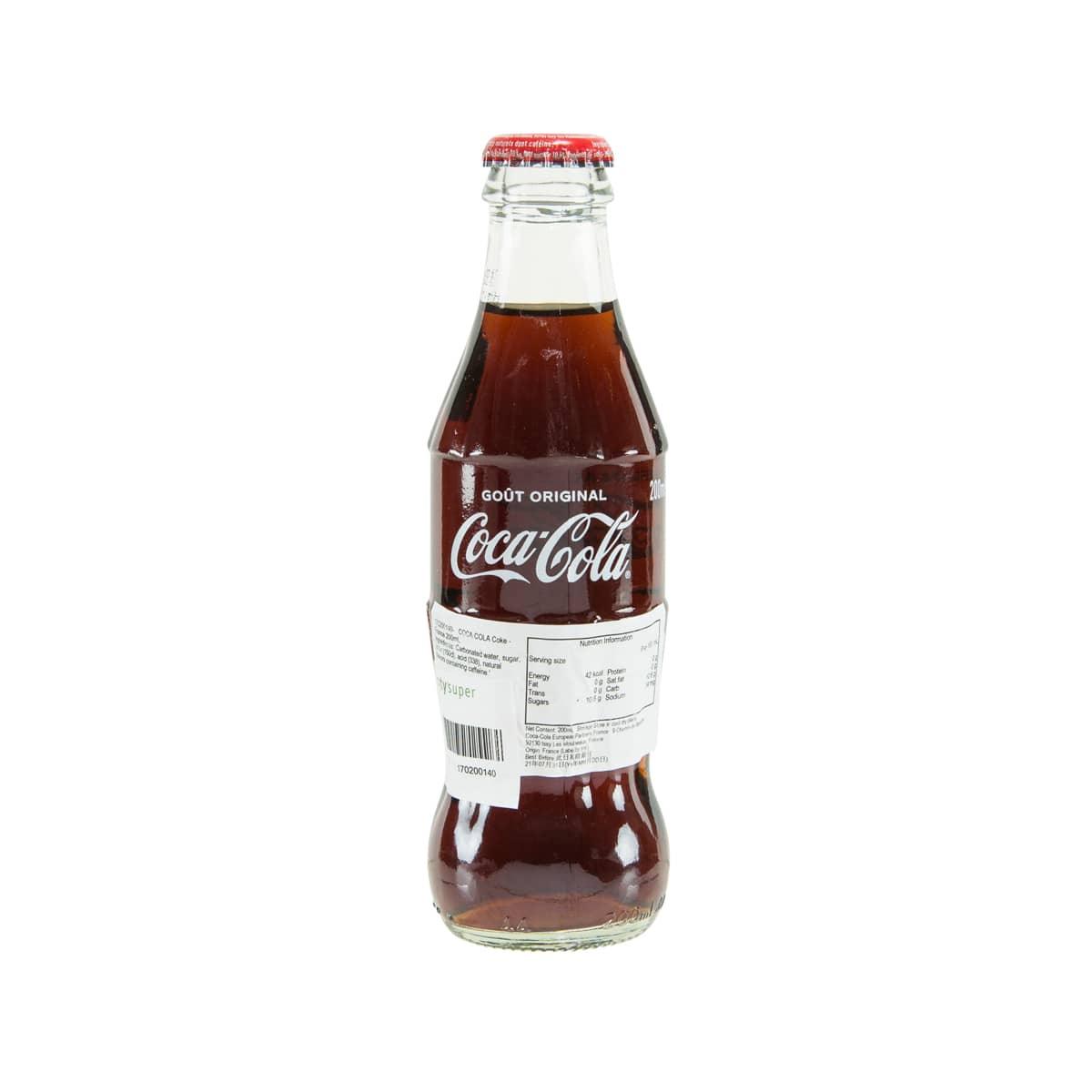 Coca-Cola Coke bottle with back label and barcode, red cap