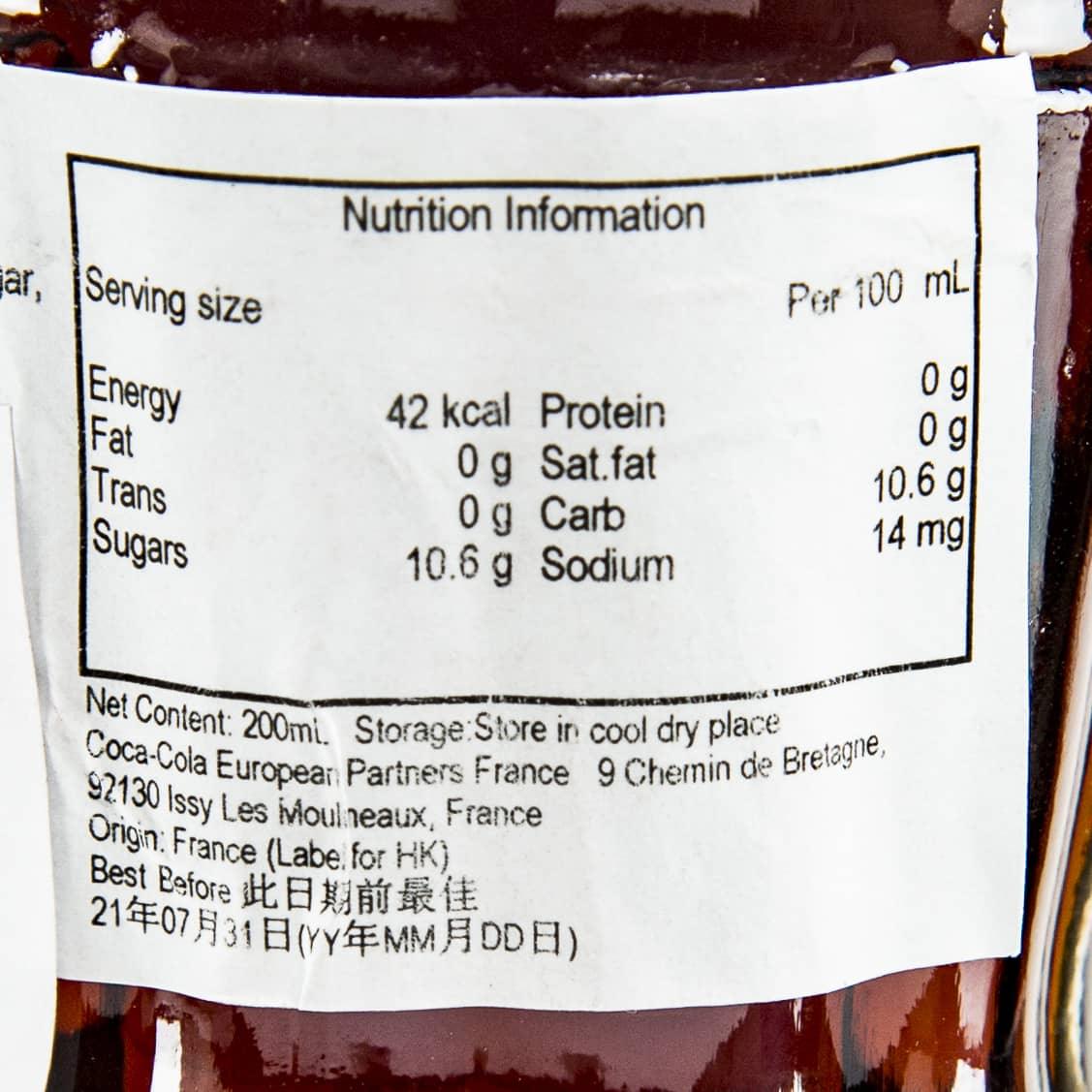 Coca-Cola Coke nutrition information label on bottle, close-up