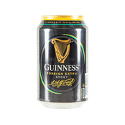 Guinness Foreign Extra Stout beer can, dark label with harp and wavy stripe design.