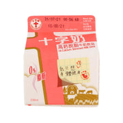 Hi-calcium skimmed milk drink carton, 236 mL, front panel with red-and-white design