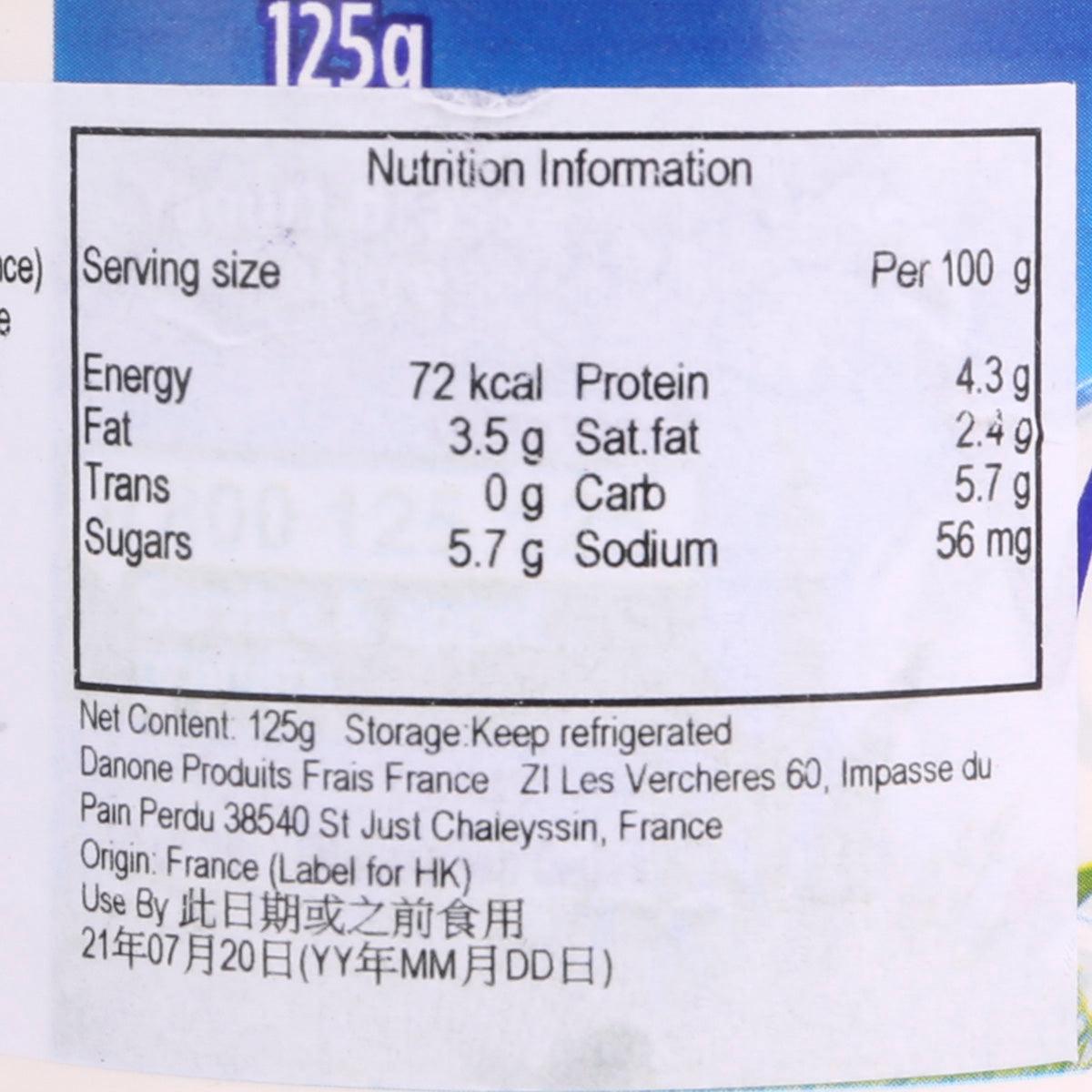 Nutrition information label close-up on 125 g natural yogurt cup