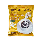 Coffee creamer sachet in gold foil with cup swirl graphic; 15 pieces