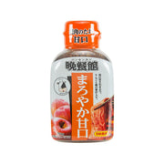 Sweet BBQ sauce bottle with orange cap and peach-colored label