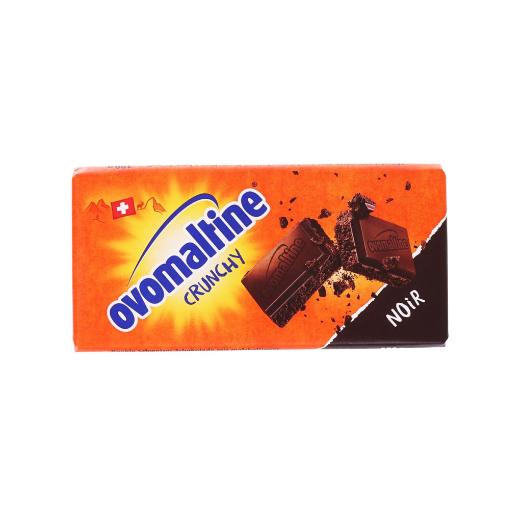 Dark chocolate bar with Ovomaltine crunchy branding, rectangular bar package front