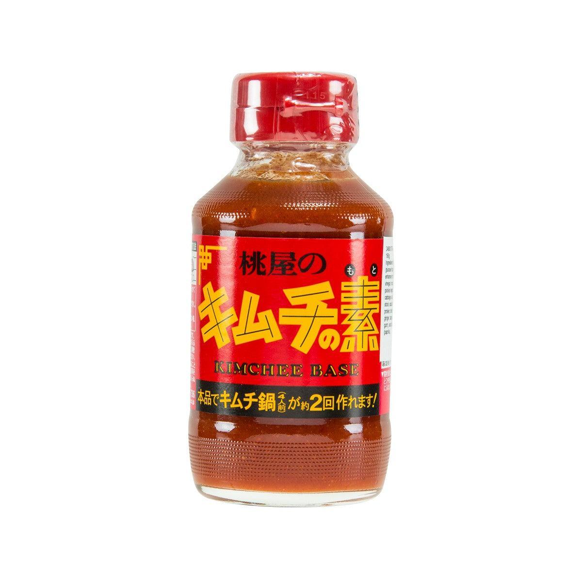MOMOYA kimchi base bottle with red cap, amber-brown liquid