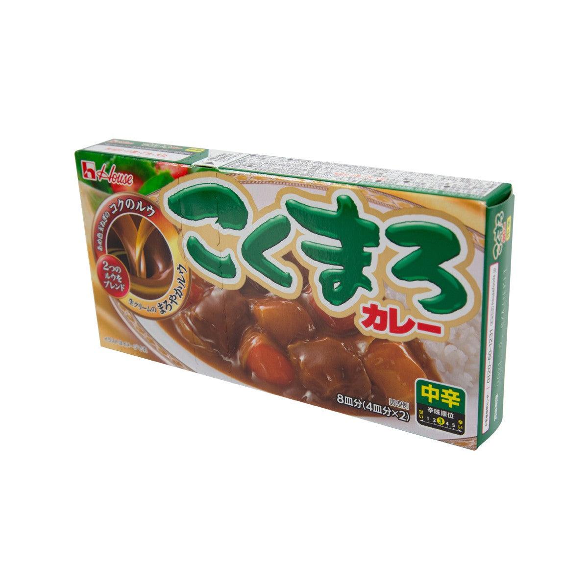 Angled HOUSE curry roux medium hot 145g box with green curry graphic and brown sauce