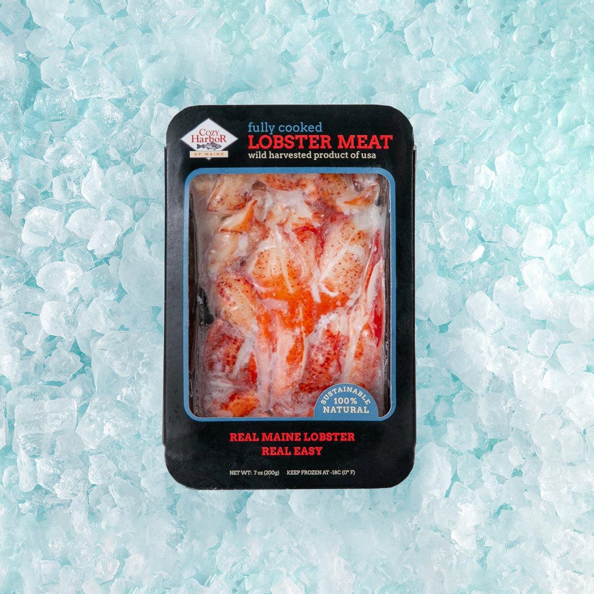 Fully cooked lobster meat pouch, clear window showing red and white chunks