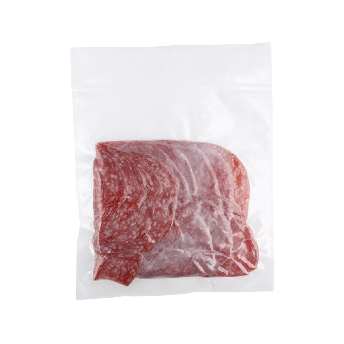 Vacuum-sealed salami loaf slices with red marbling in a clear plastic bag
