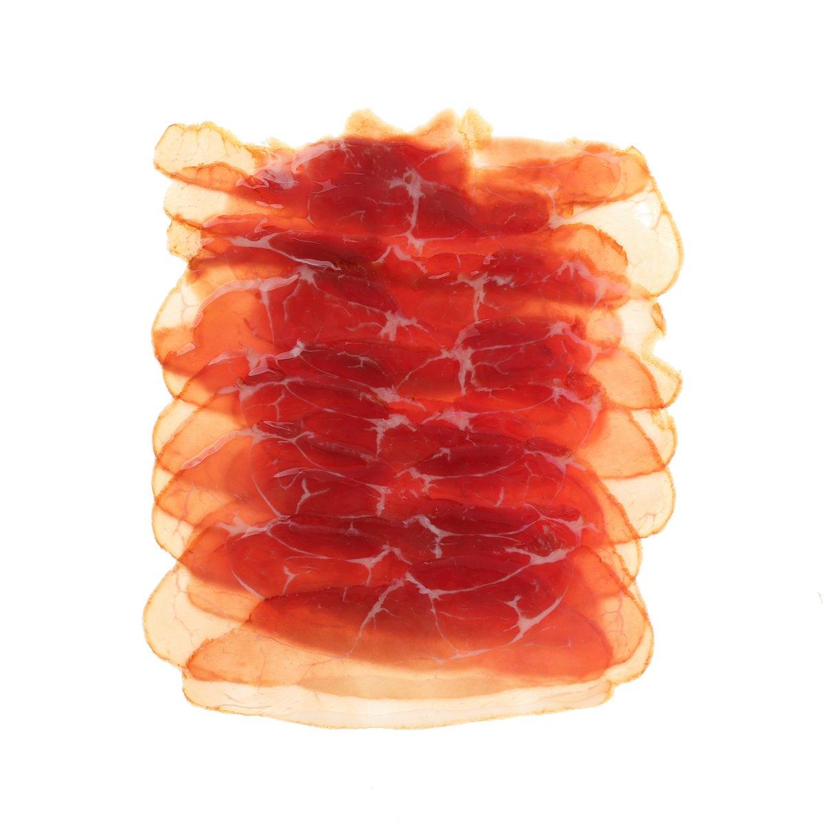 Smoked cured ham slices, red with white fat marbling