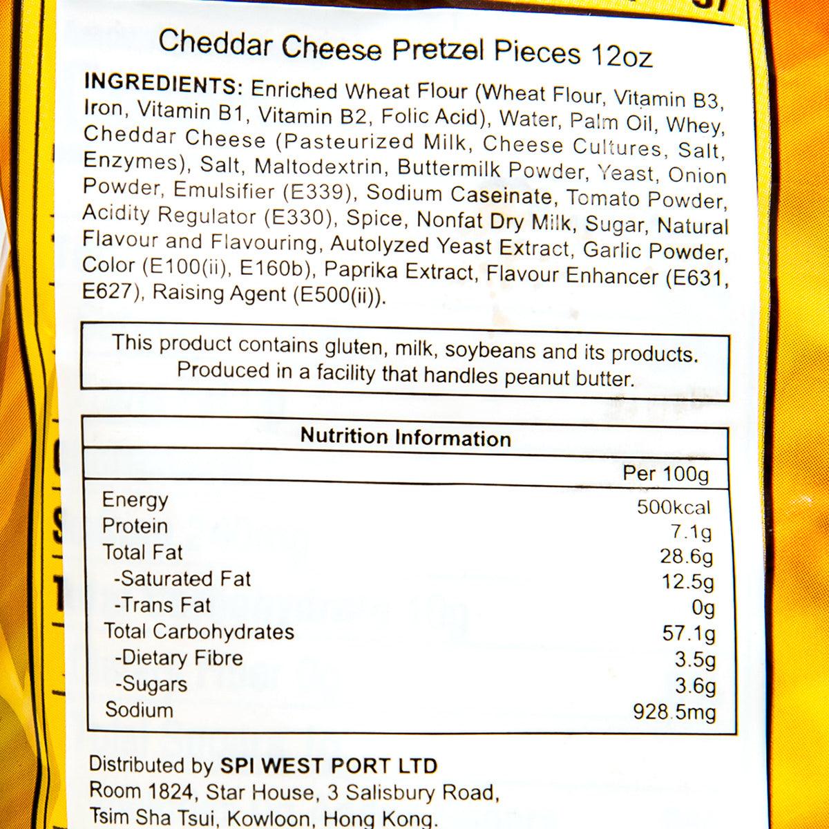 Cheddar cheese pretzel pieces label close-up: ingredients and nutrition information.