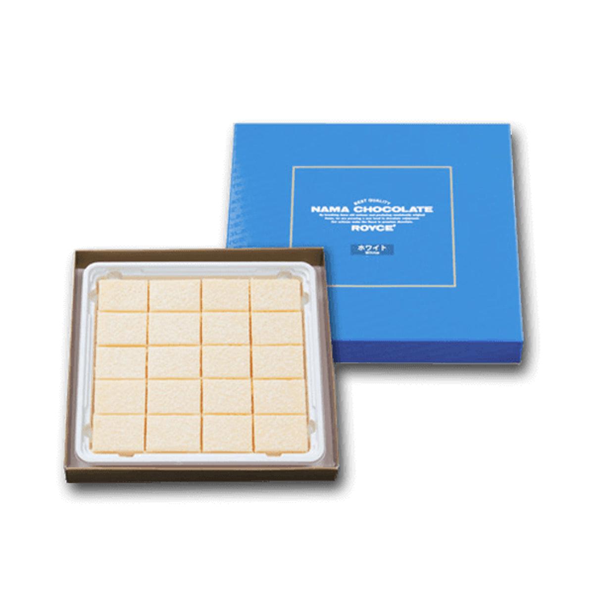 White ROYCE' nama chocolate pieces in molded tray with branded blue gift box