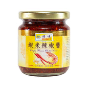 Jar of HOMEI crispy prawn chili sauce with red chili paste and gold lid