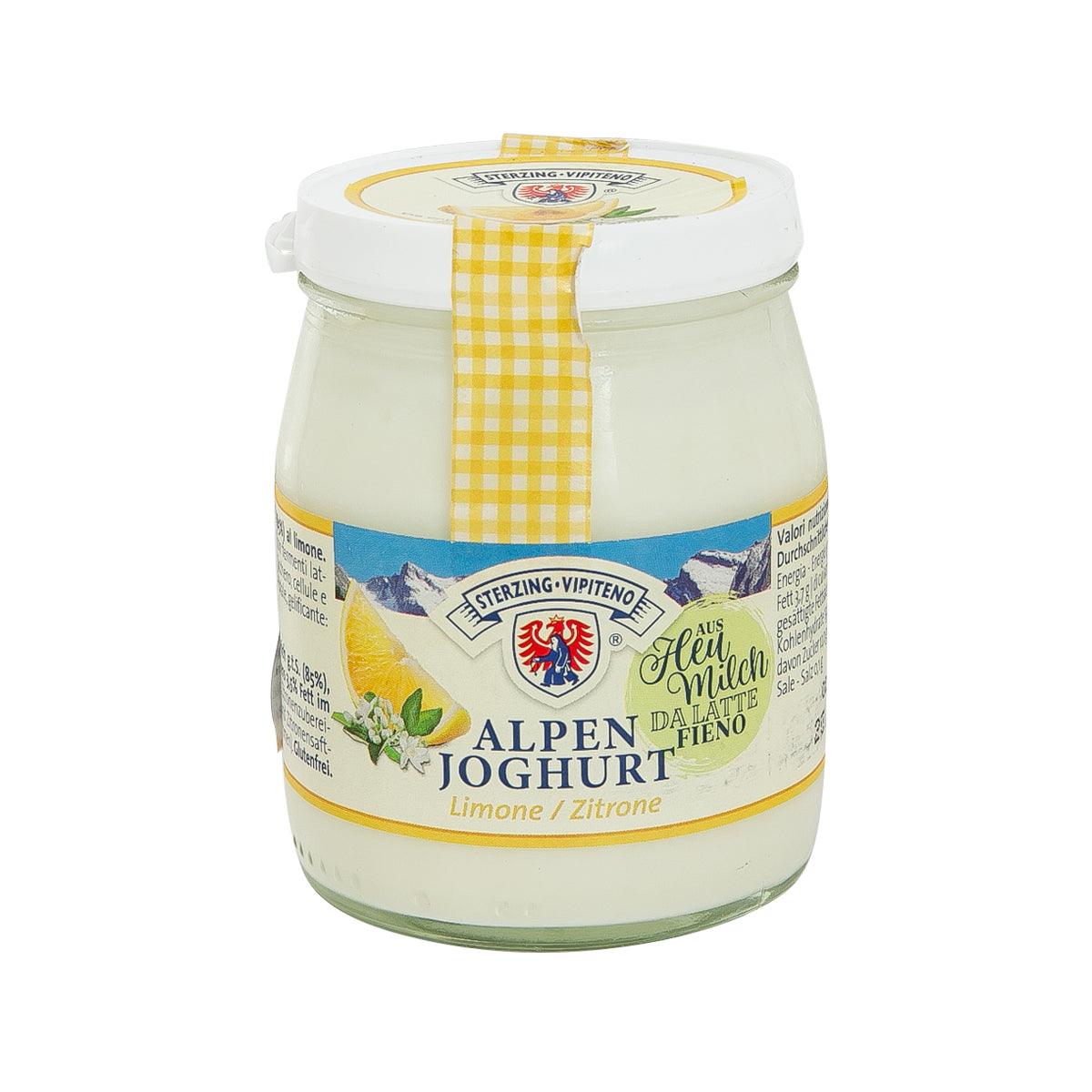 Alpen yogurt lemon glass jar with white lid and yellow label