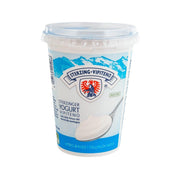 Whole milk yogurt cup with Sterzing Vipiteno label and blue mountain graphics.