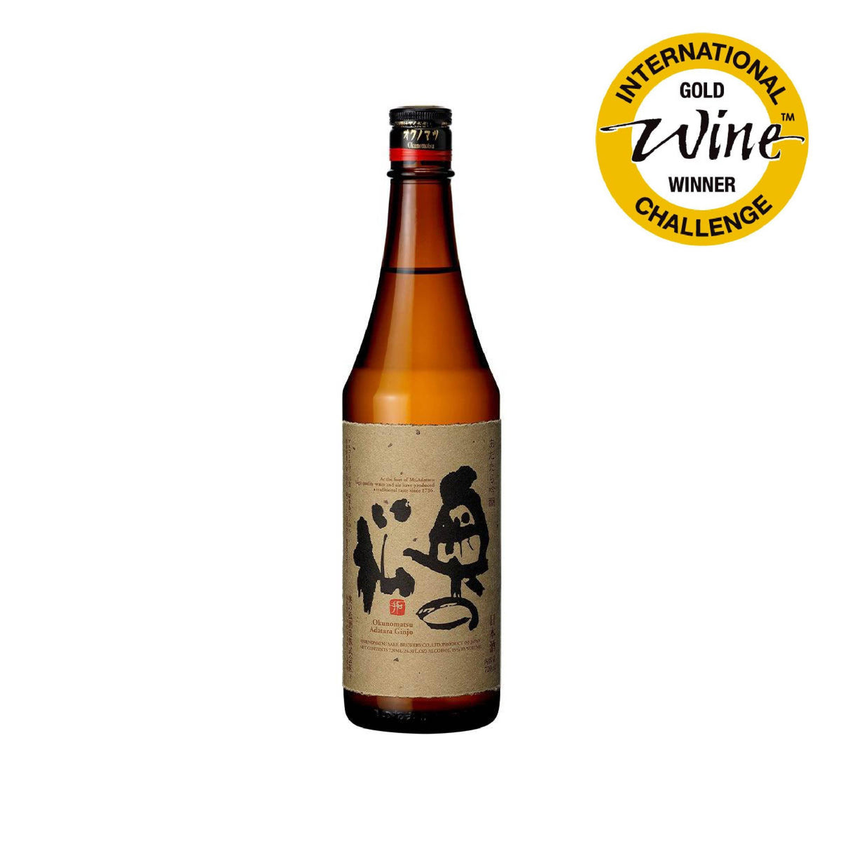 OKUNOMATSU Adatara ginjo sake bottle, amber liquid, beige label