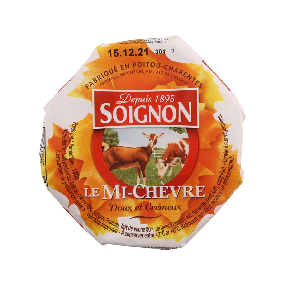 Packaged soft goat cheese wheel with orange-and-white label, circular shape.