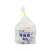 Udon noodles in sealed plastic bag, white label with blue text and barcode