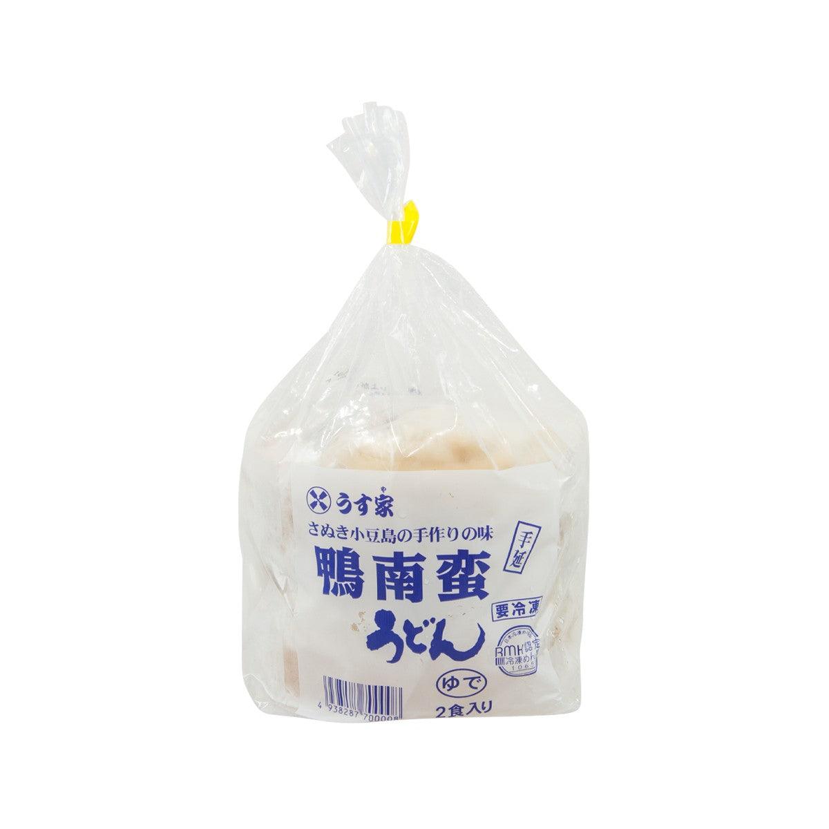 Udon noodles in sealed plastic bag, white label with blue text and barcode